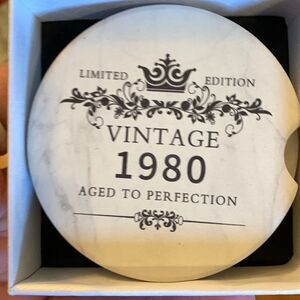 Two absorbable ceramic car coasters